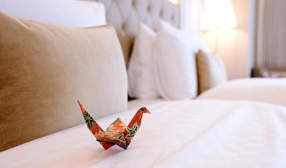 The Okura Prestige Taipei Hotel Exterior photo A paper crane